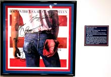 Signed album covers on exhibit through March 27