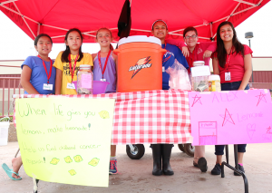  Jake McMahon/Pioneer Rachel Vu, 11, Faith Tran, 11, Alexandra Butler, 11, Esmeralda Garcia, 13, Madeline Angiel, 13, and Iliana Silva, 13, sell lemonade at Alex’s Lemonade Stand near the entrance to OCCC’s SEM center on July 9.