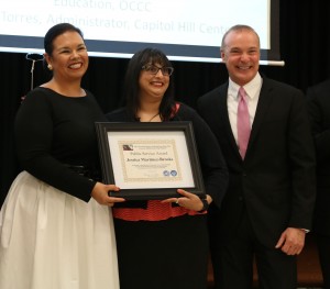  Jake McMahon/Pioneer Community Outreach and Education Director Jessica Martinez-Brooks, left, poses with UNA-OKC President Priya Desai, and then-OCCC President Paul Sechrist. Martinez-Brooks was given a UNA public service award June 30 for outstanding public service.