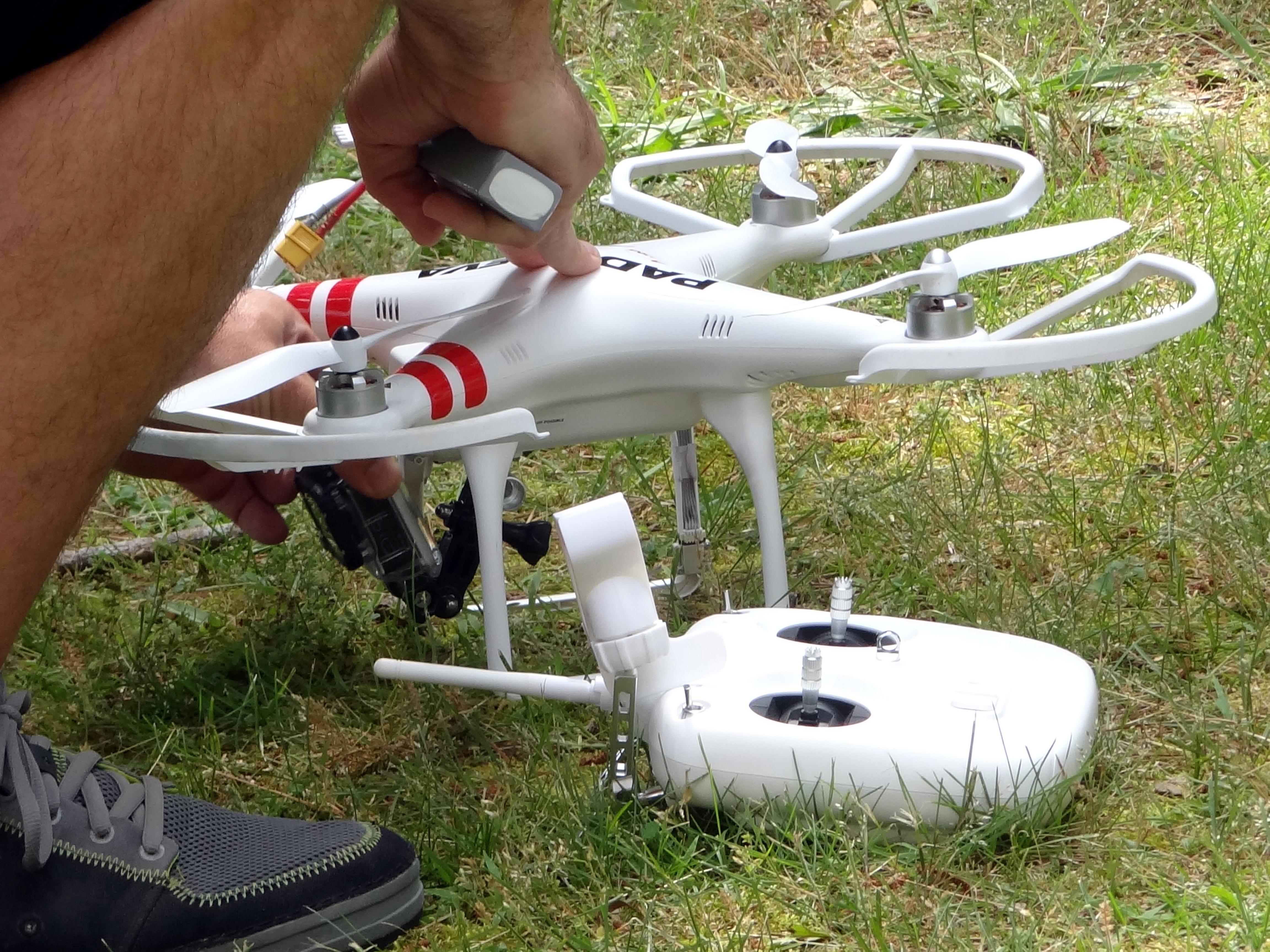 Drone and remote on grass