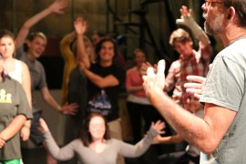 Theater Professor Brent Noel addresses auditioning students in the Bruce Owen Theater.