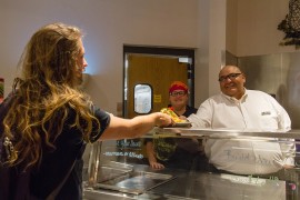 Food Service Director Dave Cordova serves up hot, wholesome food.  Aaron Cardenas/Pioneer