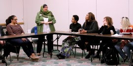 Mary Ann Bodine Al-Sharif speaks during Coffee and Race presentation. Photo by Zachary Volk/Pioneer