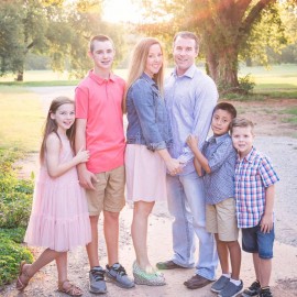 The Falen Family poses for a family portrait shortly after adopting Jefri. Photo from Kara Falen Facebook page.