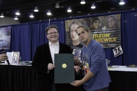 Jason Mewes receiving citation of appreciation from representative. Photo by Sean Stanley