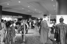 People and cosplayers wait outside the convention center. Photo by Sean Stanley.